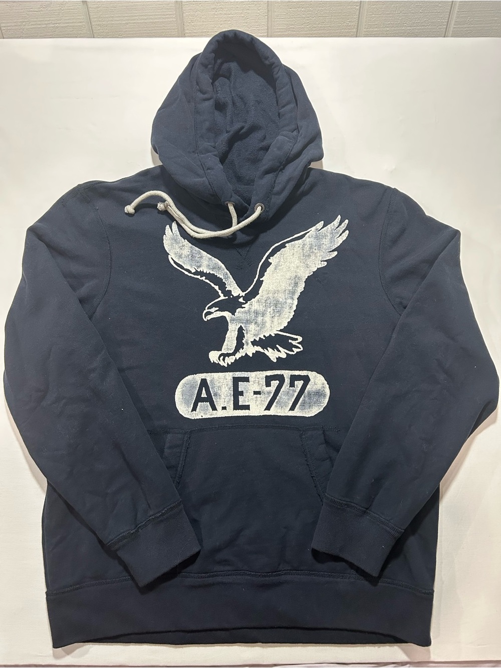 American Eagle Outfitters Navy Hoodie with White Eagle Graphic
